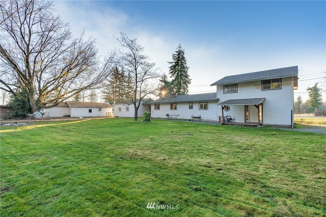 7370 Enterprise Road Ferndale, WA 98248 - Photo 1 of 25 a view of a house with a back yard