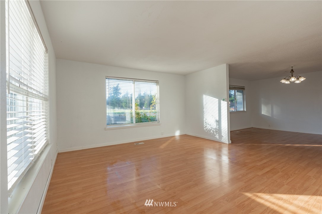 7370 Enterprise Road Ferndale, WA 98248 - Photo 4 of 25 a view of empty room with wooden floor and fan