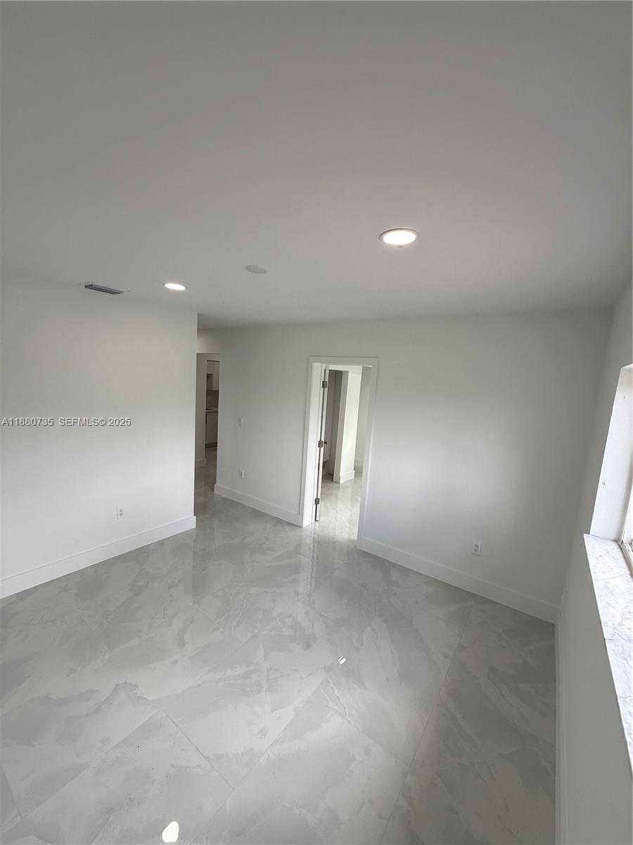 841 West 50th Street, Unit 2 Hialeah, FL 33012 - Photo 10 of 12 a view of an empty room