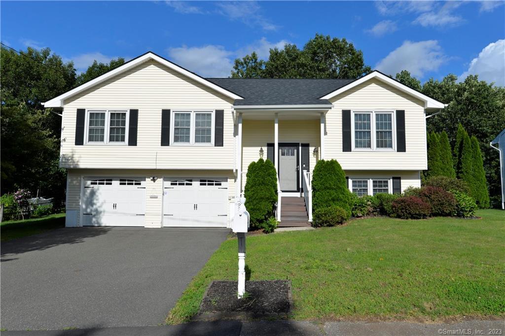 281 Stoddard Road Waterbury, CT 06708 - Photo 1 of 1 a view of a house with a yard