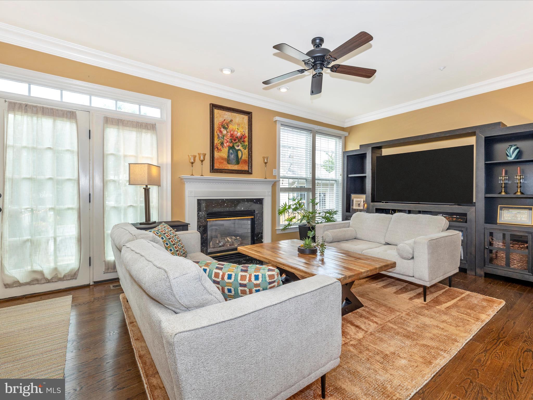 1731 Derrs Square West Frederick, MD 21701 - Photo 21 of 53 Gas fireplace and access to back yard & parking