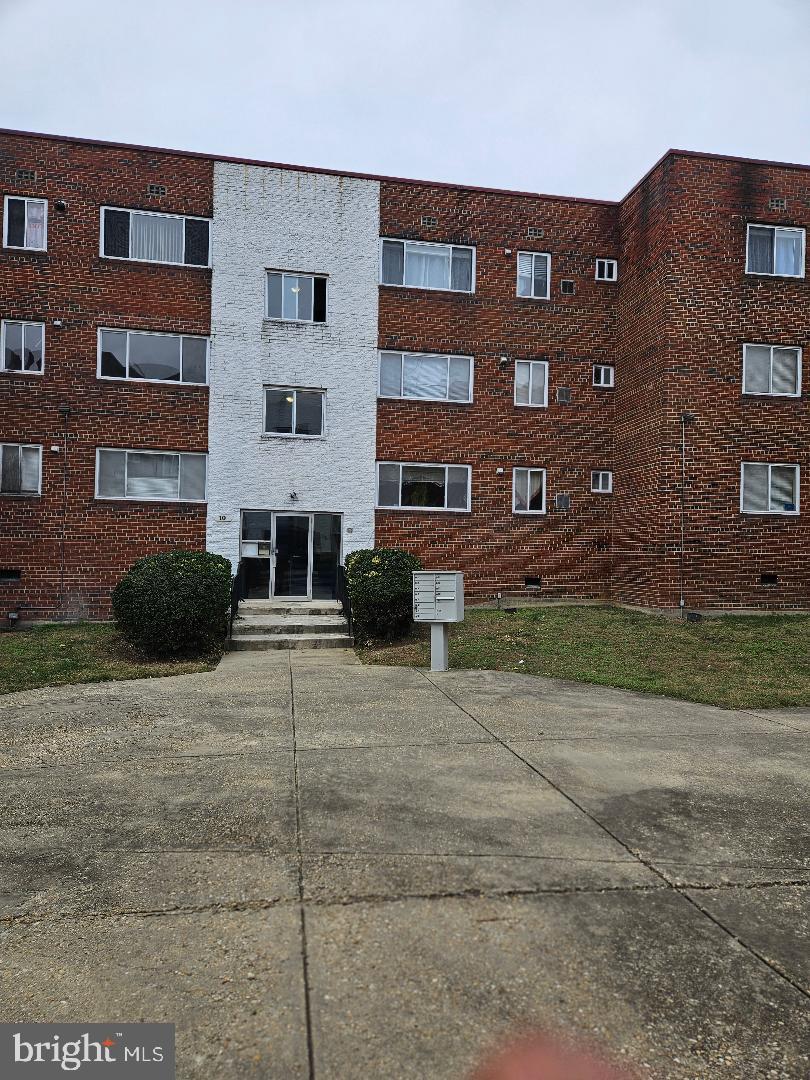 10 Halley Place Southeast, Unit 203 Washington, DC 20032 - Photo 1 of 13 a front view of a building
