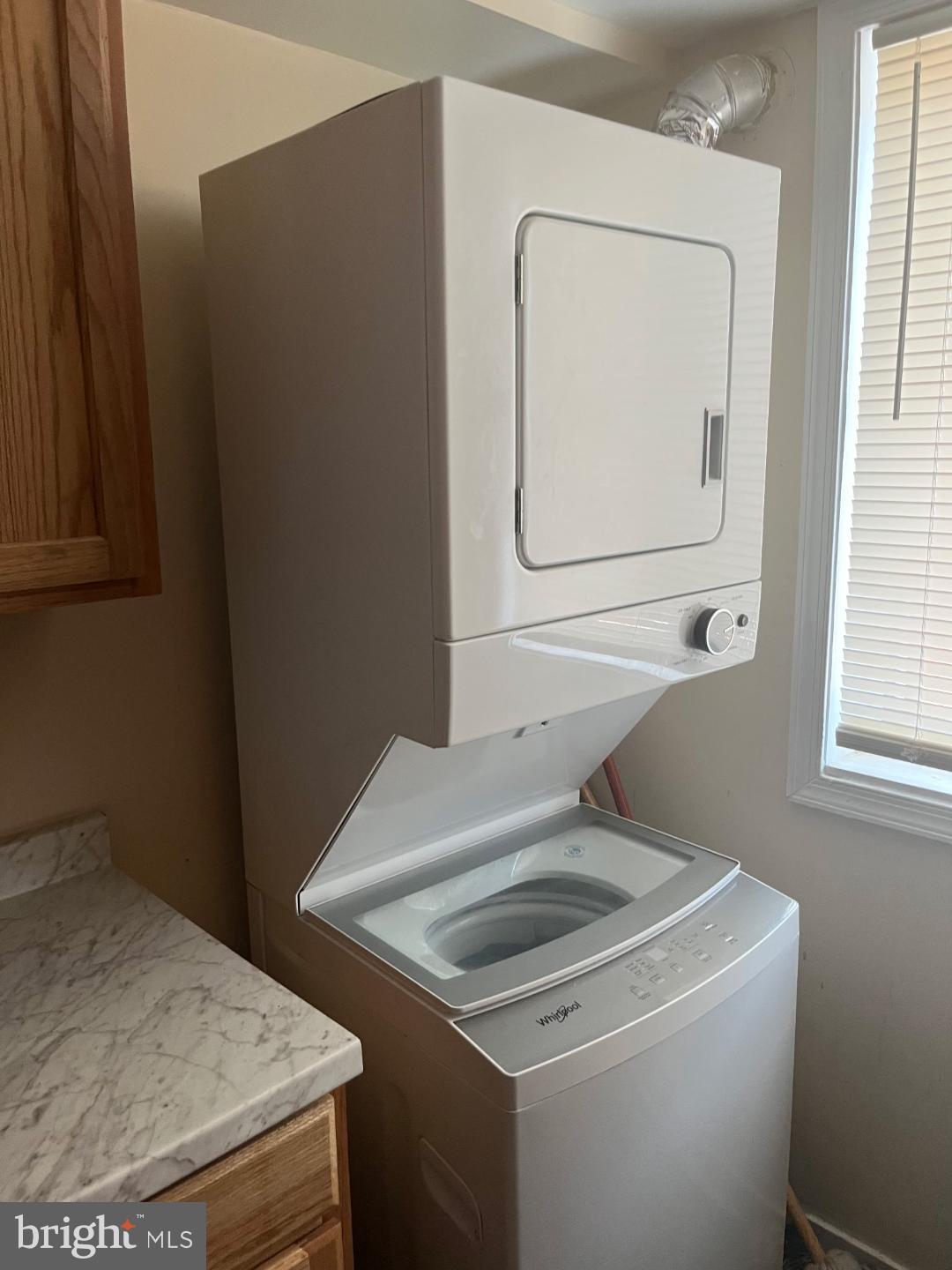 10 Halley Place Southeast, Unit 203 Washington, DC 20032 - Photo 13 of 13 a utility room with dryer and washer