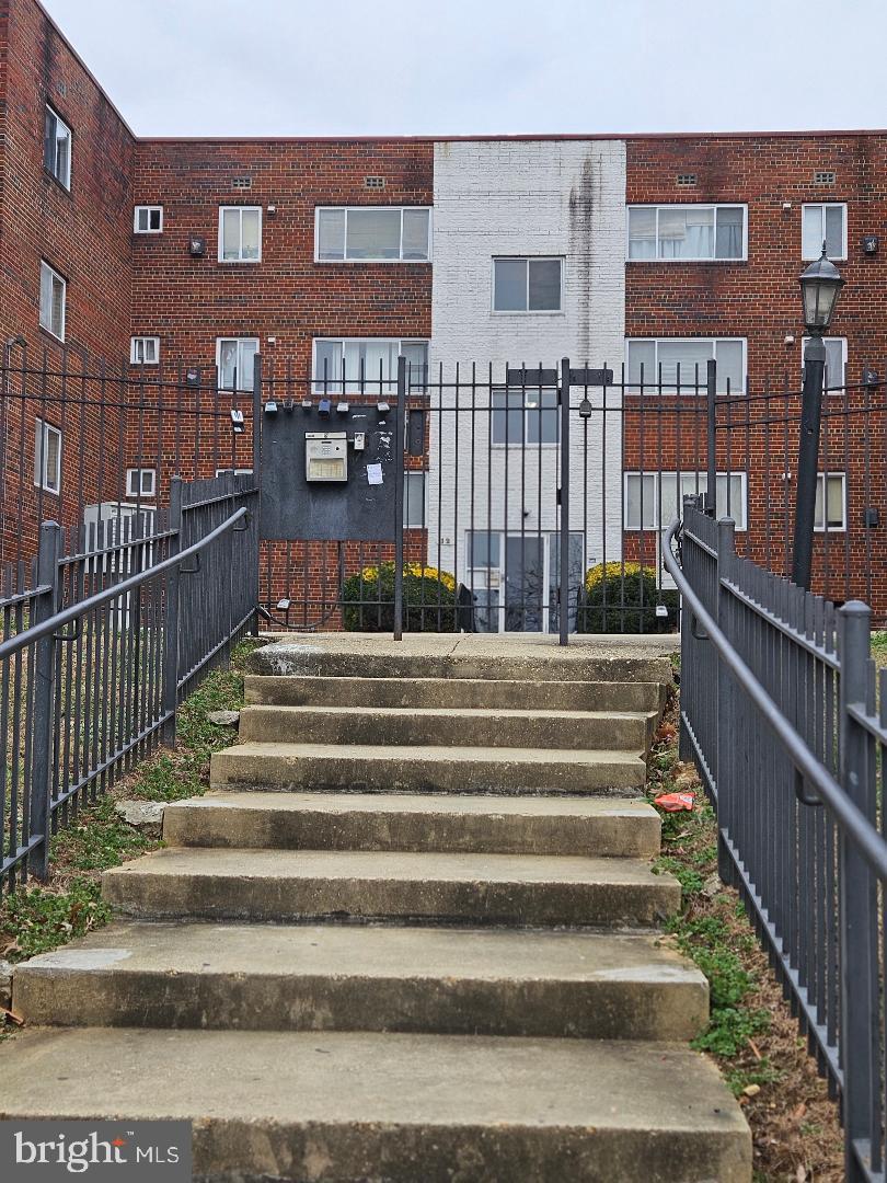 10 Halley Place Southeast, Unit 203 Washington, DC 20032 - Photo 2 of 13 a view of building with staircase