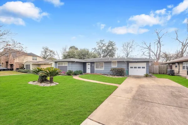 a house view with a garden space