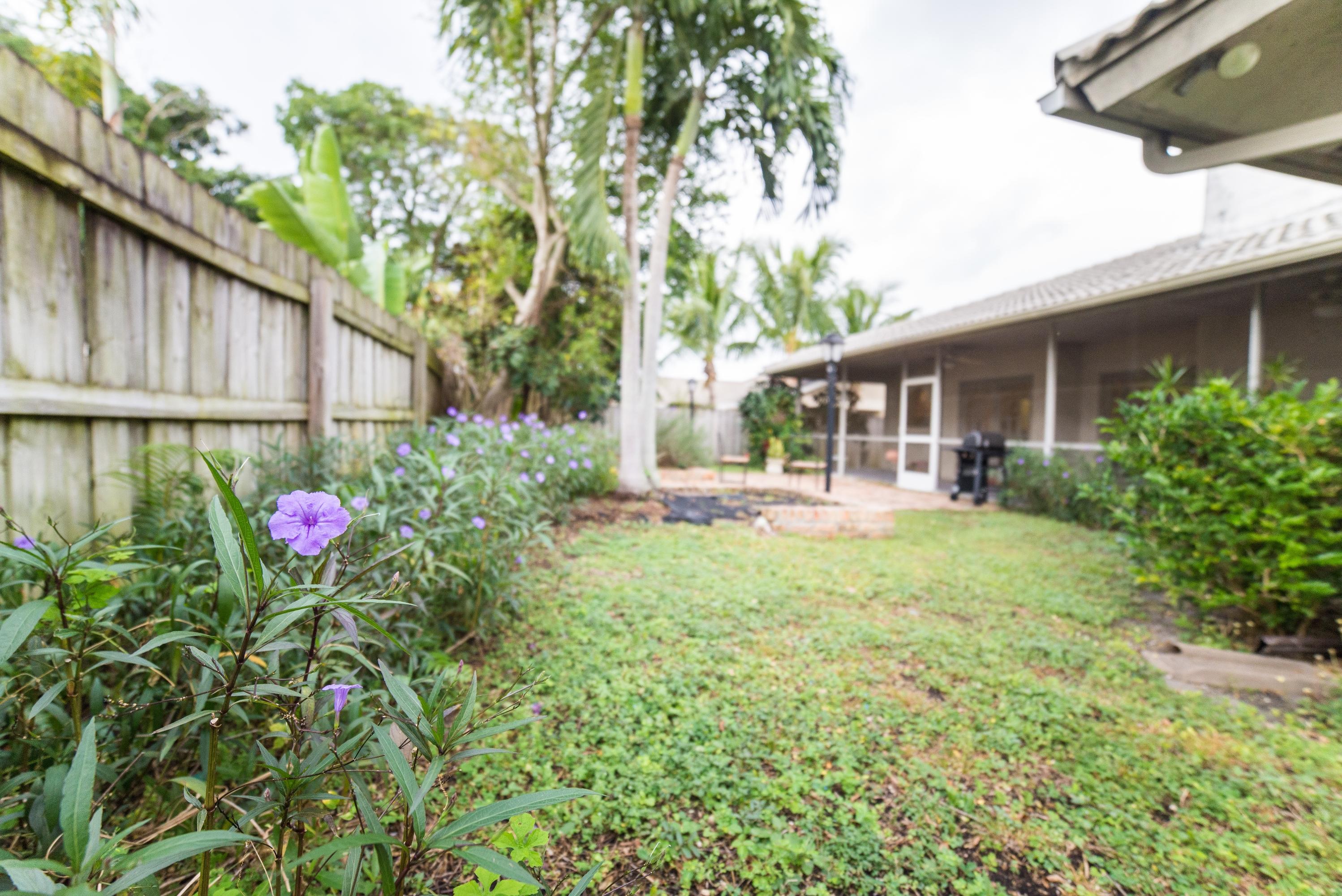 17746 Woodview Terrace Boca Raton, FL 33487 - Photo 5 of 44 backyard flower