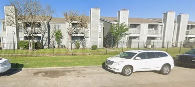 a car parked in front of a house