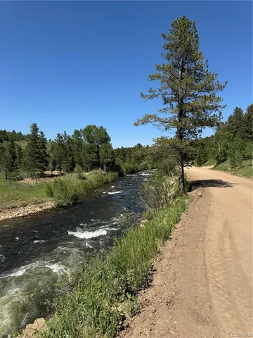 a view of a lake with outdoor space