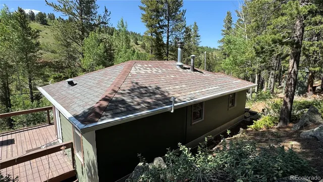 a view of a backyard with a patio