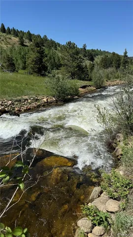 a view of a lake with beach
