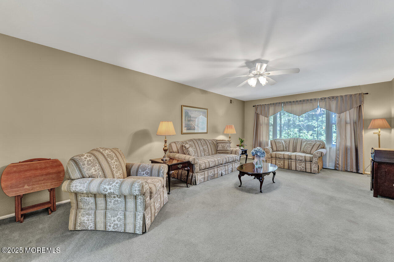 72 Jean Street Lakewood, NJ 08701 - Photo 14 of 34 a living room with furniture and a large window