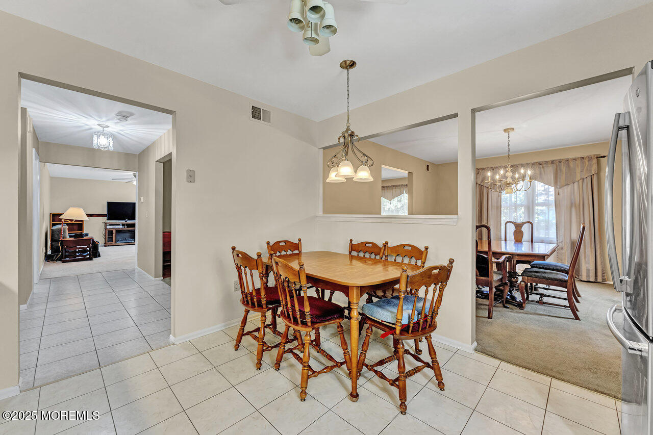 72 Jean Street Lakewood, NJ 08701 - Photo 17 of 34 a view of a dining room with furniture