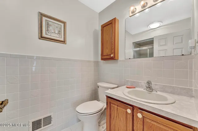 a bathroom with a sink and a toilet