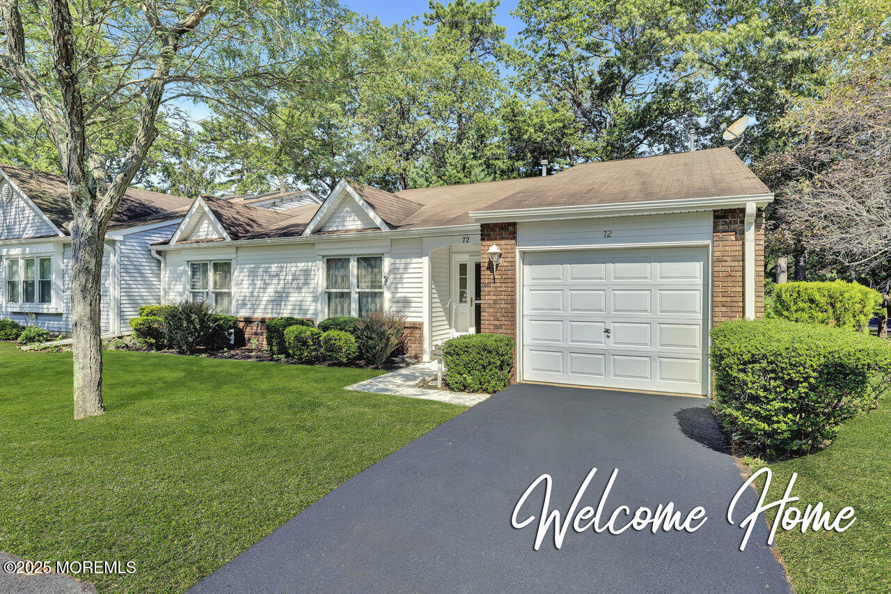 72 Jean Street Lakewood, NJ 08701 - Photo 24 of 34 a front view of a house with a yard