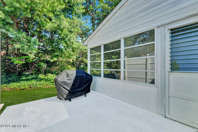 a view of a house with a back yard