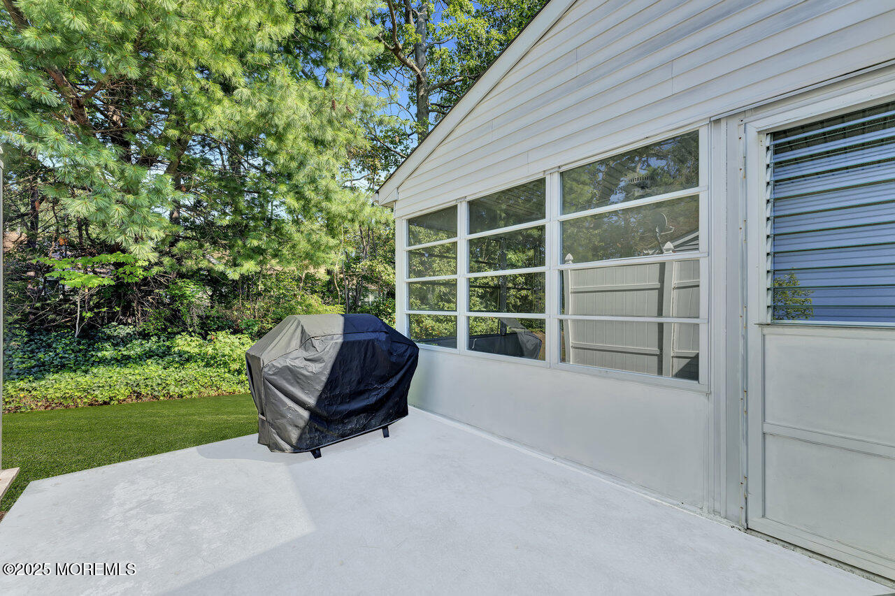 72 Jean Street Lakewood, NJ 08701 - Photo 32 of 34 a view of a house with a back yard