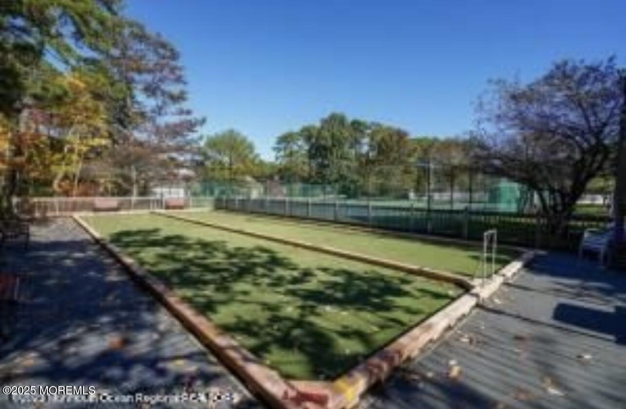 72 Jean Street Lakewood, NJ 08701 - Photo 33 of 34 a view of a backyard with a garden