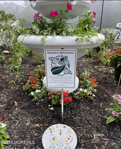 a view of a sign board in a yard