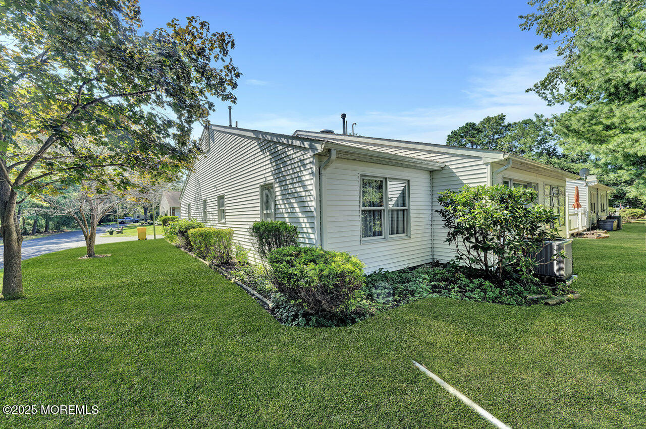 72 Jean Street Lakewood, NJ 08701 - Photo 6 of 34 a view of a house with a yard