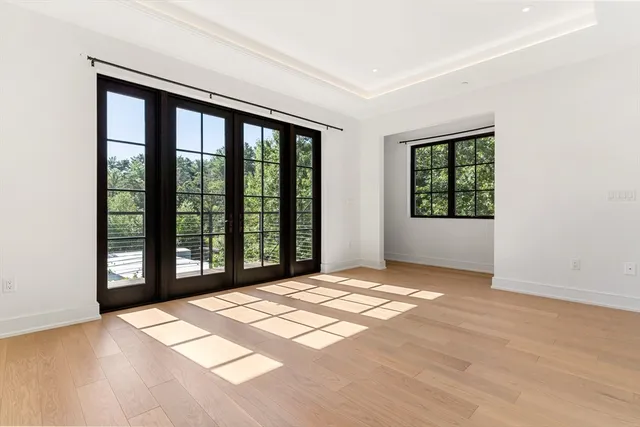 a view of a room with a large window