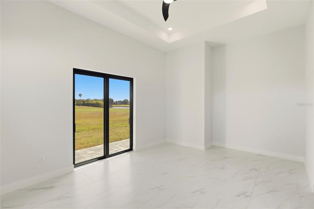 17 Long Meadow Road Rotonda West, FL 33947 - Photo 22 of 37 an empty room with a window