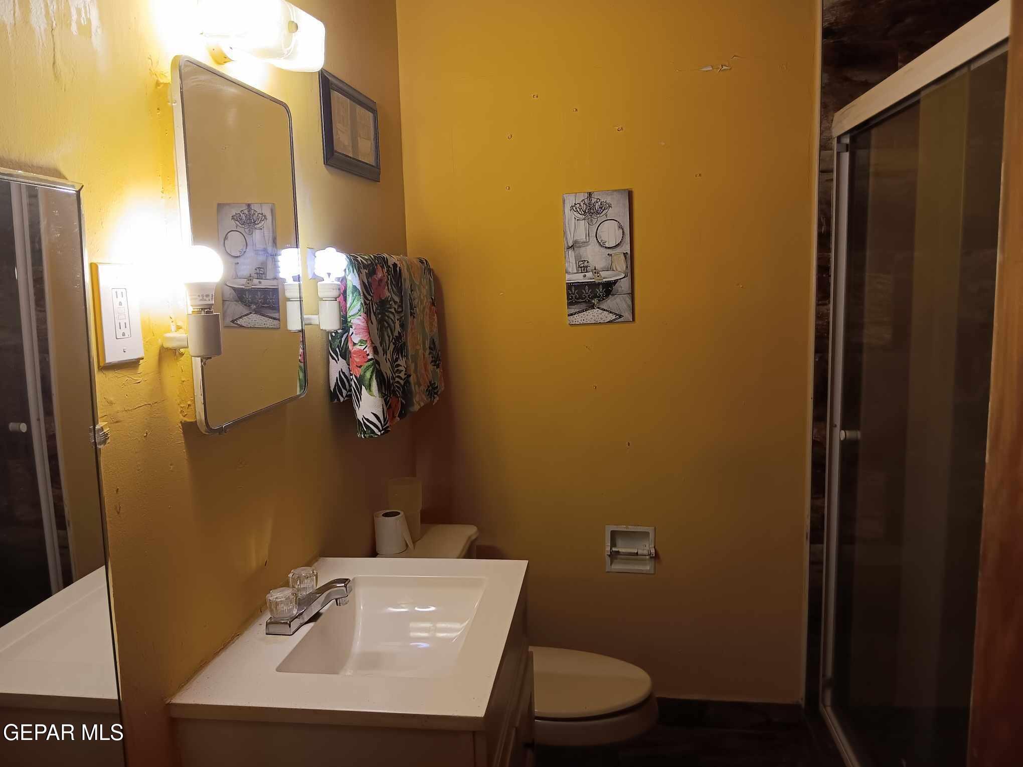 3 Atkinson Way El Paso, TX 79915 - Photo 11 of 19 a bathroom with a sink toilet and shower