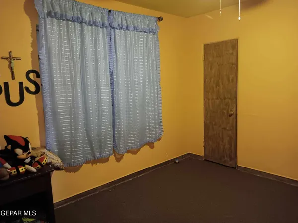 a view of a door and chair