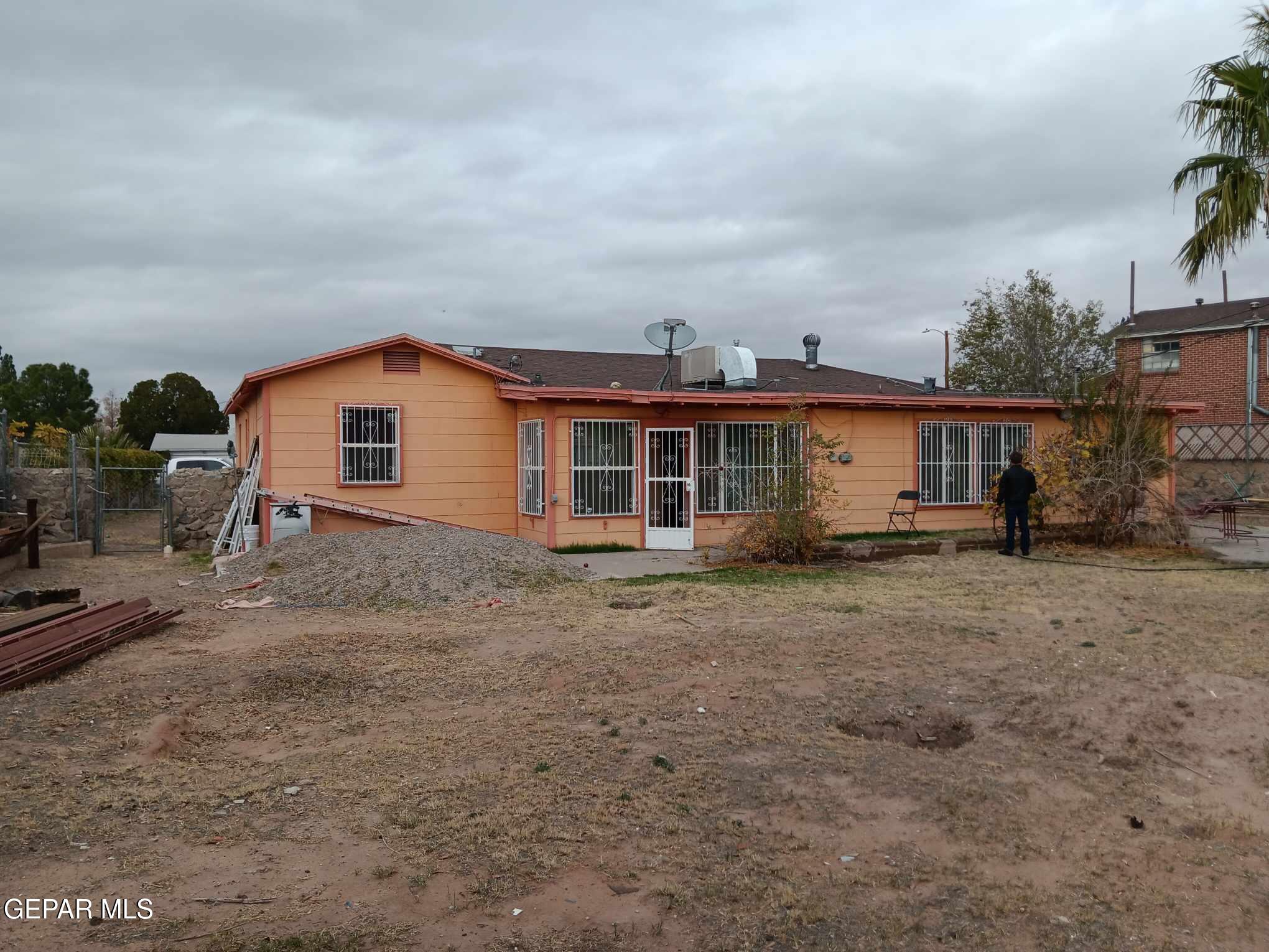 3 Atkinson Way El Paso, TX 79915 - Photo 18 of 19 a view of a house with a backyard