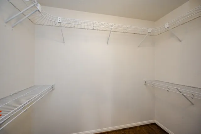a view of a room with racks on the wall