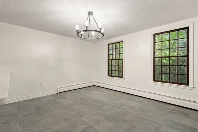 an empty room with windows