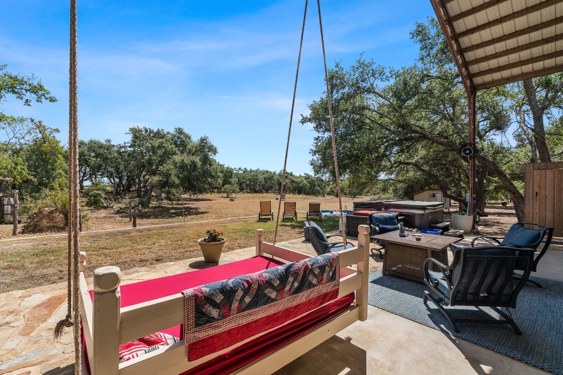 7394 Creek Road Dripping Springs, TX 78620 - Photo 24 of 39 a view of an outdoor sitting area