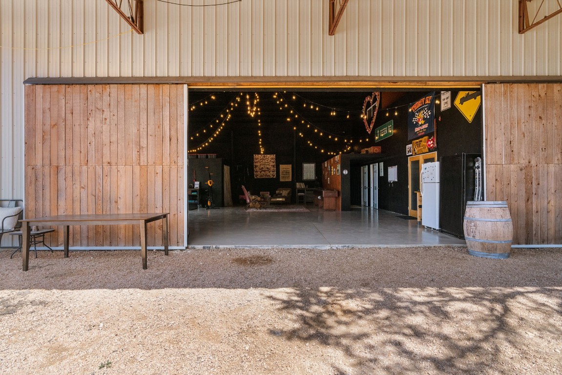 7394 Creek Road Dripping Springs, TX 78620 - Photo 5 of 39 a view of a patio with table and chairs