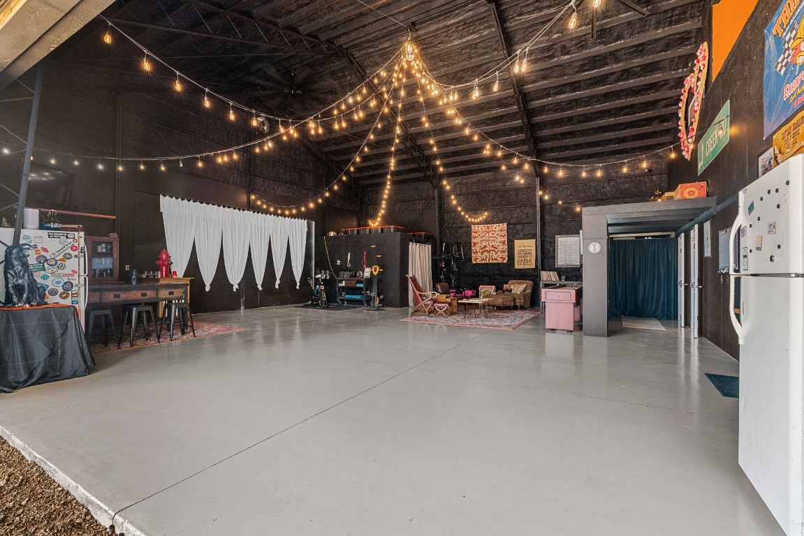 7394 Creek Road Dripping Springs, TX 78620 - Photo 6 of 39 a view of a studio with wooden floor