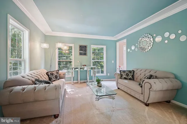 a dining room with table and chairs