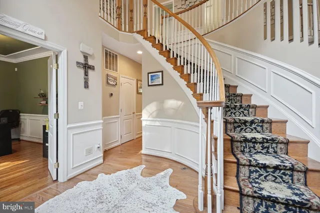 a spacious bedroom with a bed and a walk in closet
