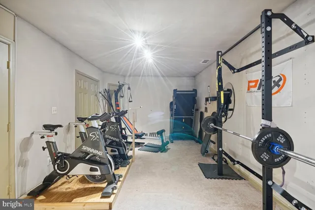 a view of a swimming pool with chairs