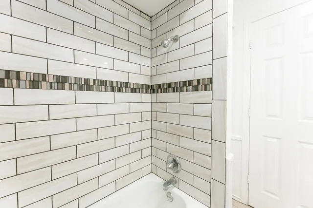 a close up of a white marble wall