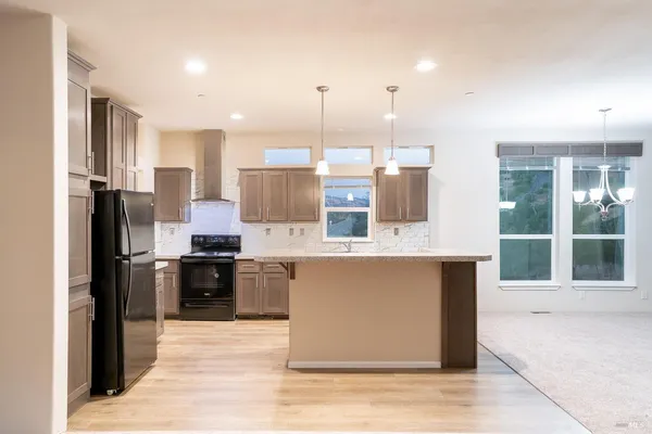 a large kitchen with cabinets