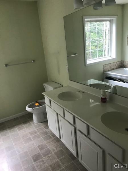 2512 Valley View Acres Road Stroudsburg, PA 18360 - Photo 14 of 23 a bathroom with a sink and a toilet