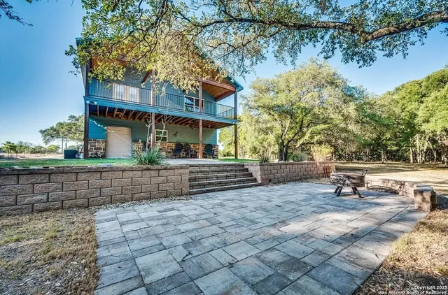 a view of house with a outdoor seating