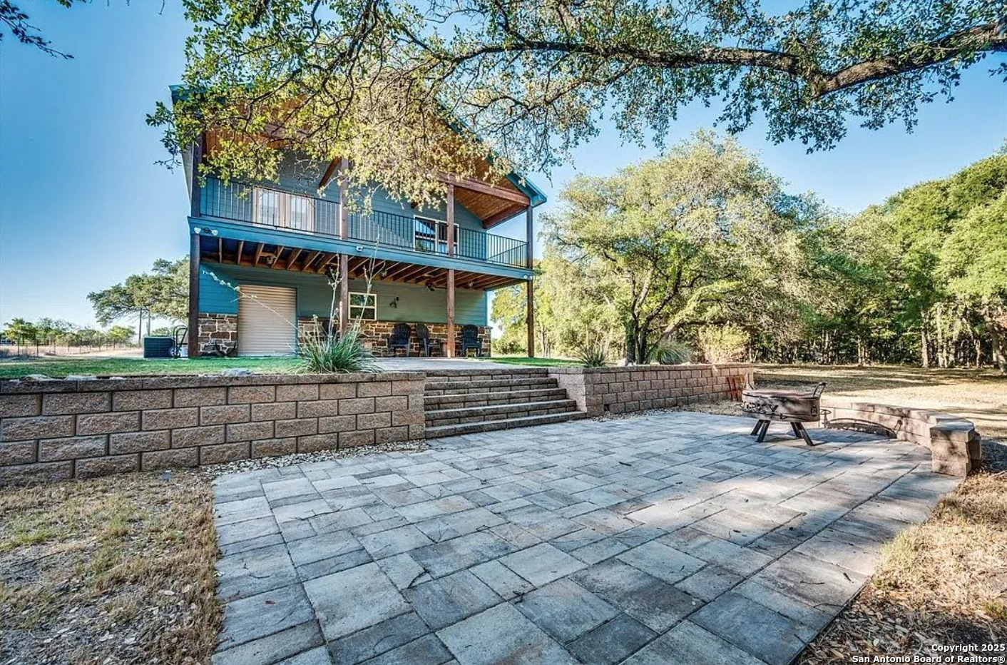 a view of house with a outdoor seating