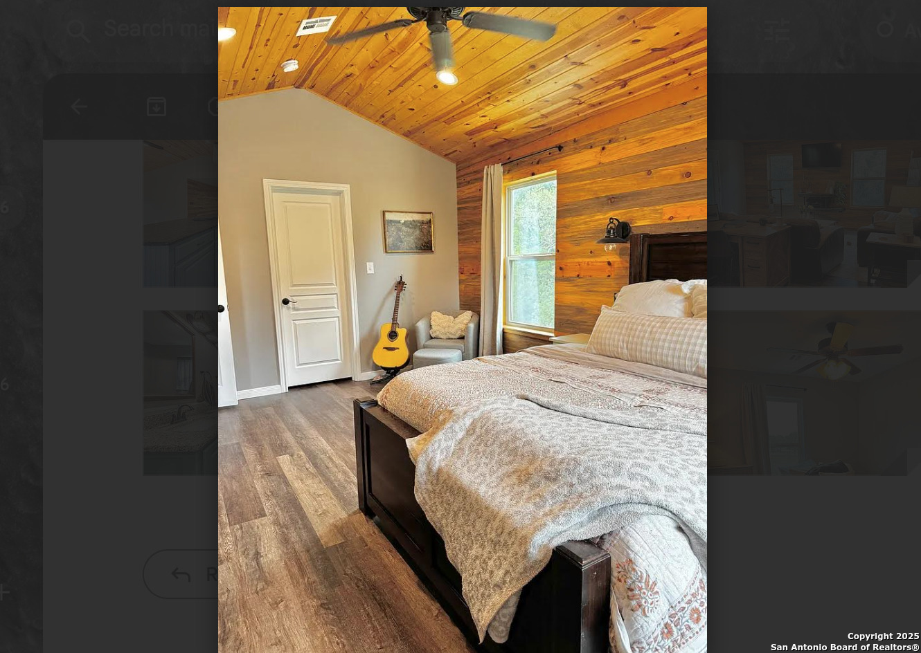 416 Coxs Oak Valley Road Waco, TX 76705 - Photo 11 of 24 a bed sitting in a bedroom next to a window