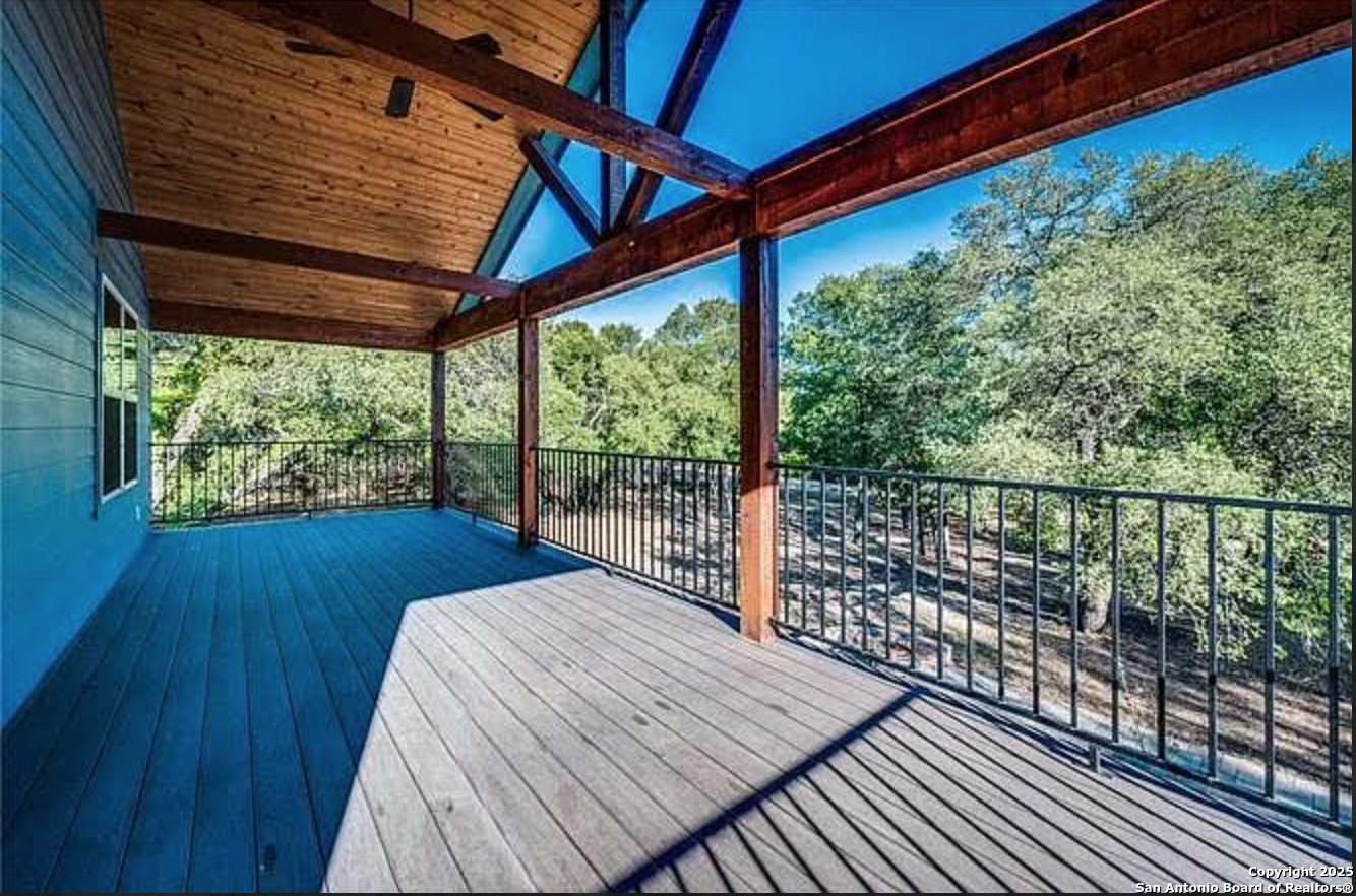 416 Coxs Oak Valley Road Waco, TX 76705 - Photo 13 of 24 a balcony with wooden floor in outdoor space