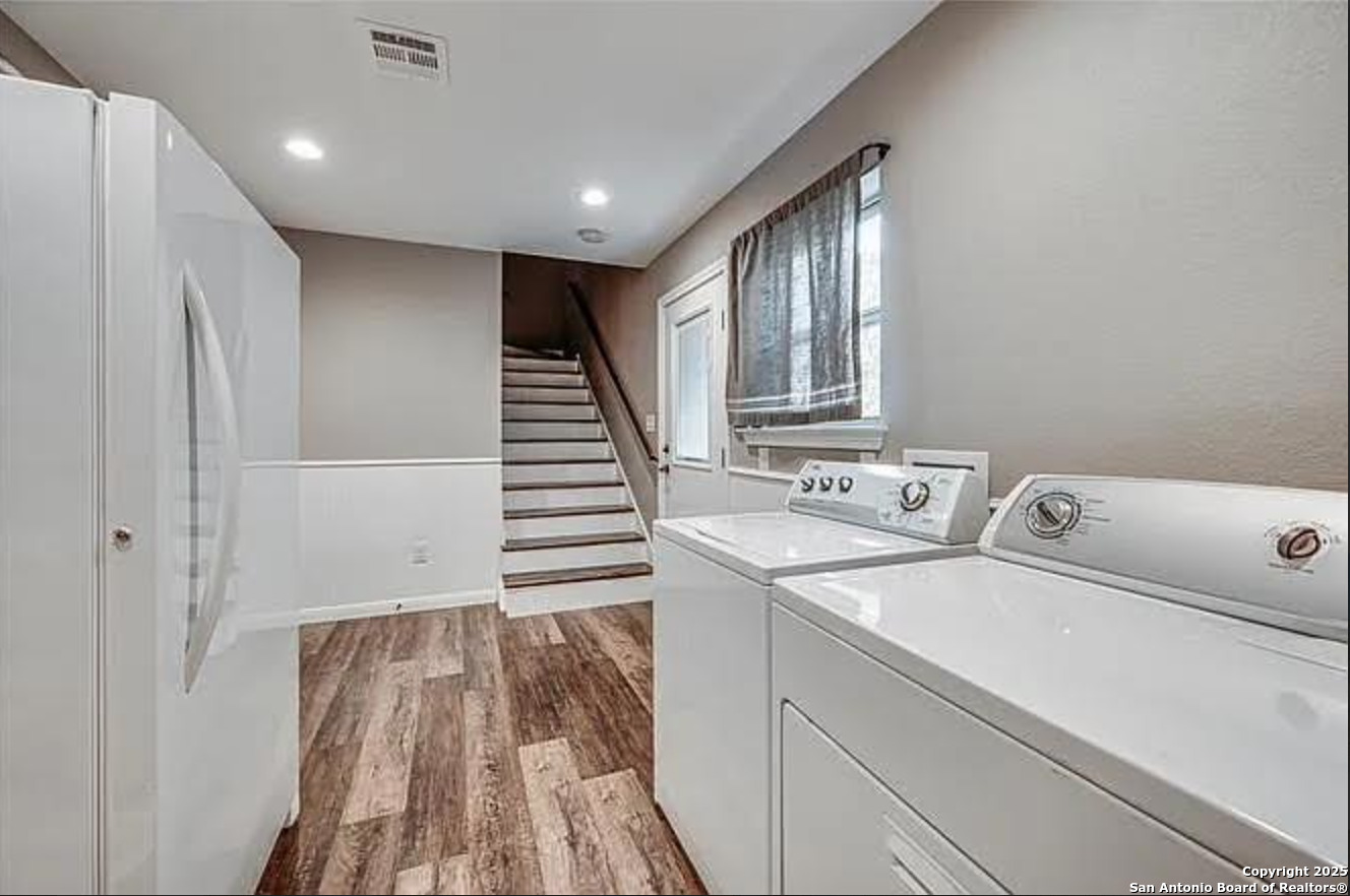 416 Coxs Oak Valley Road Waco, TX 76705 - Photo 16 of 24 a view of a hallway with washer and dryer