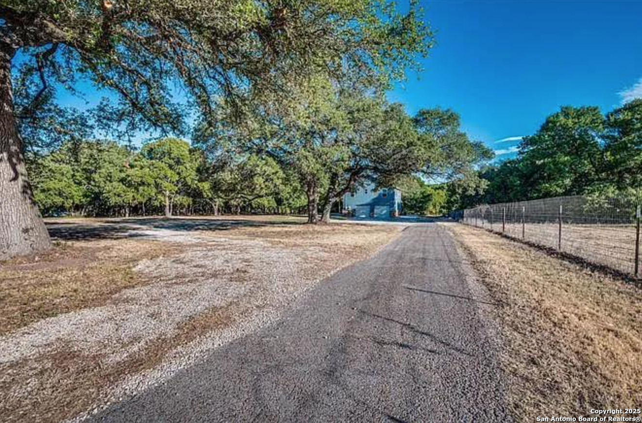 416 Coxs Oak Valley Road Waco, TX 76705 - Photo 17 of 24 a view of backyard with green space