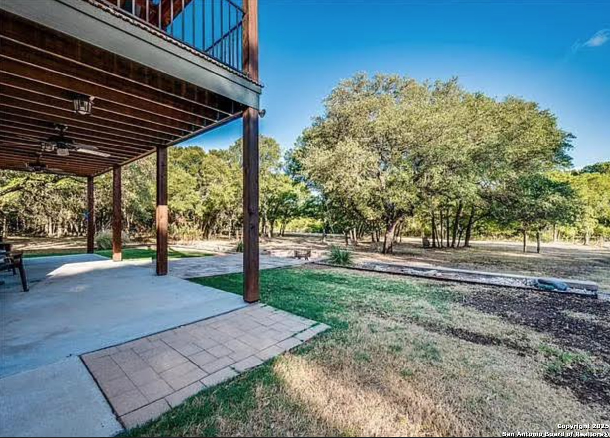 416 Coxs Oak Valley Road Waco, TX 76705 - Photo 2 of 24 a view of a backyard with large trees
