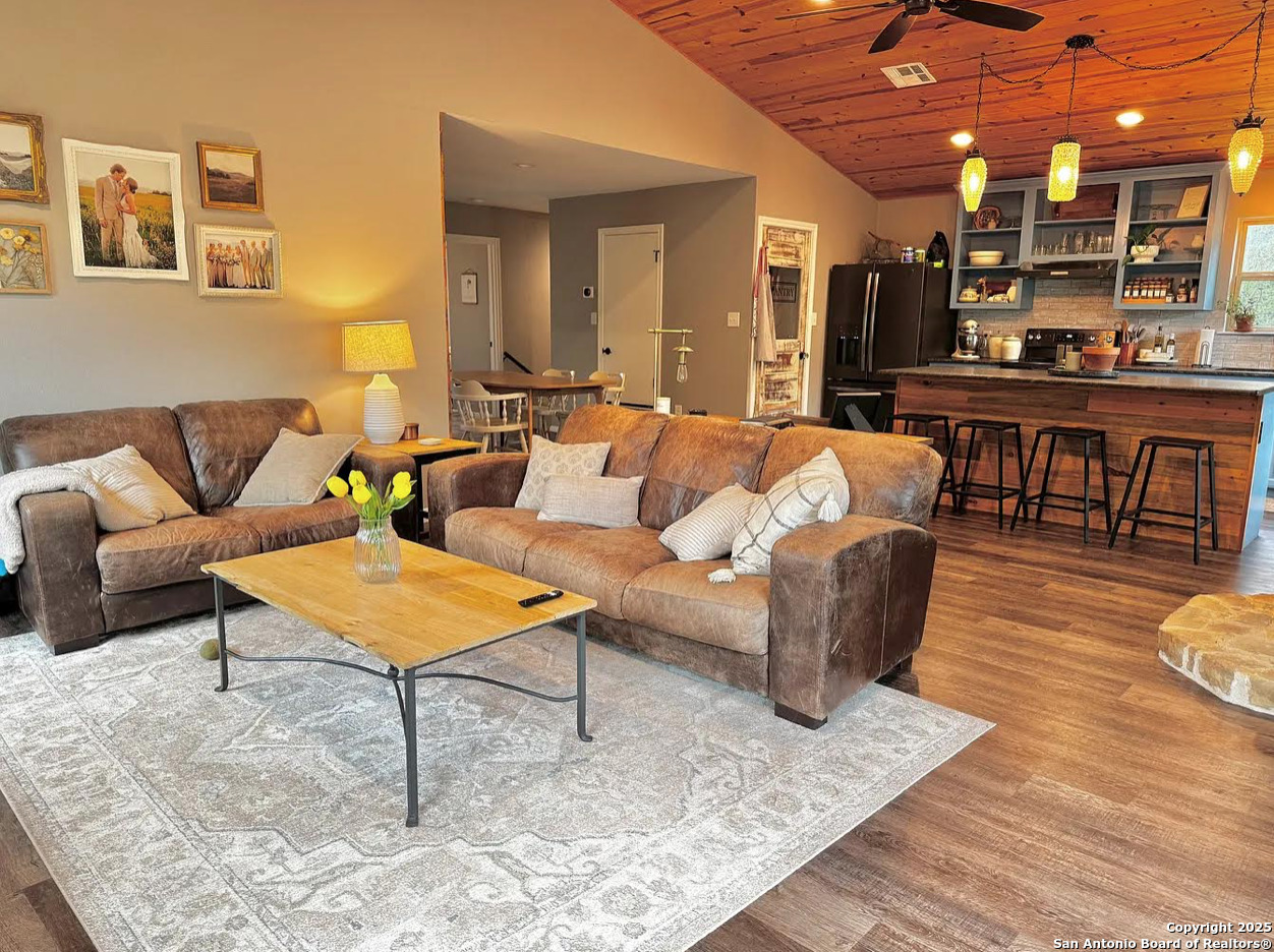 416 Coxs Oak Valley Road Waco, TX 76705 - Photo 7 of 24 a living room with furniture and kitchen view