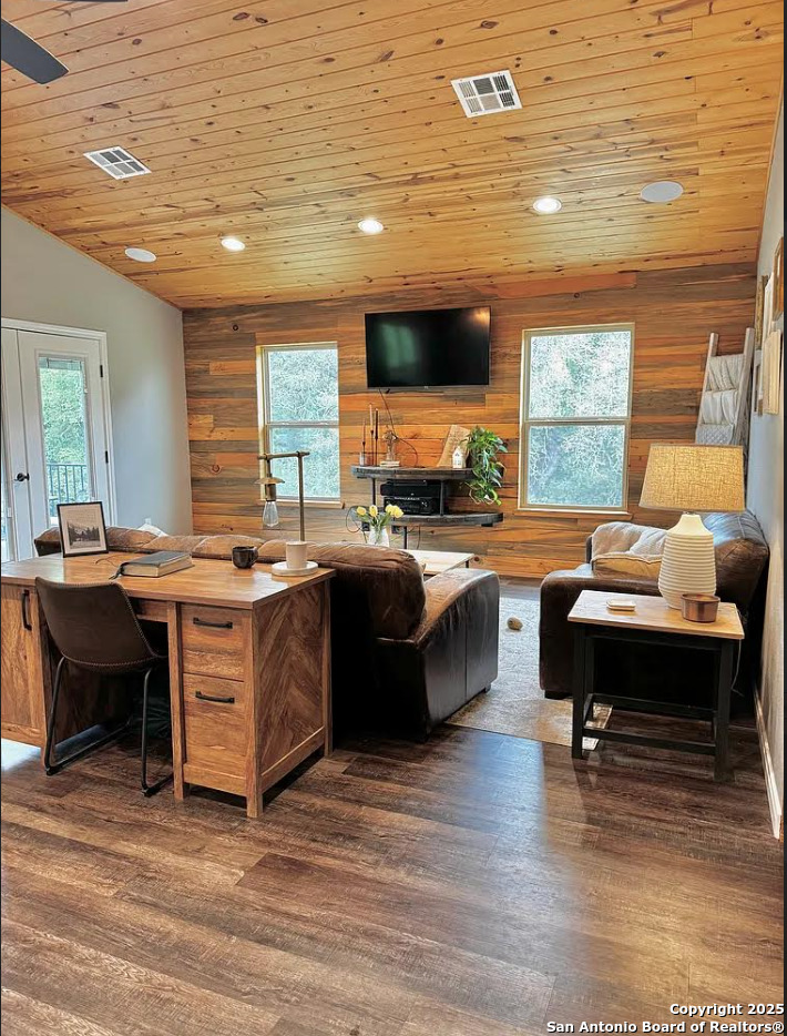 416 Coxs Oak Valley Road Waco, TX 76705 - Photo 8 of 24 a living room with furniture and a flat screen tv
