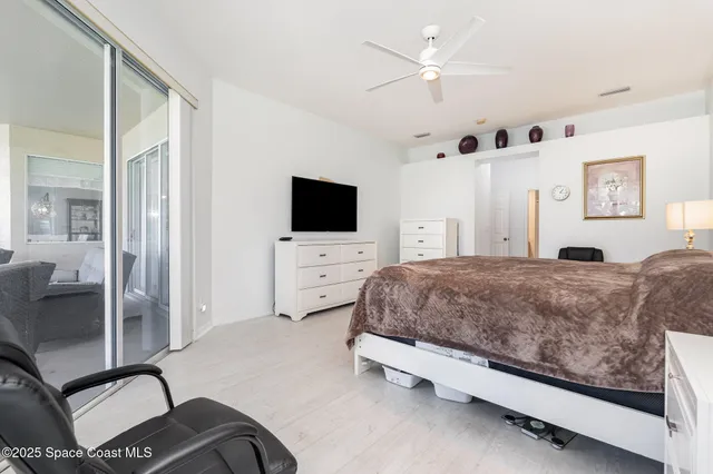 a living room with a couch and a flat screen tv
