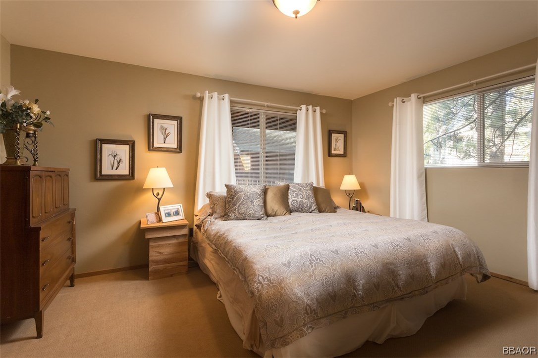 738 Silver Tip Drive Big Bear Lake, CA 92315 - Photo 13 of 30 a bedroom with a bed and a window